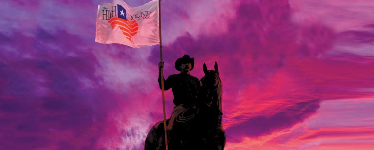 man on horseback with TX flag preload 1